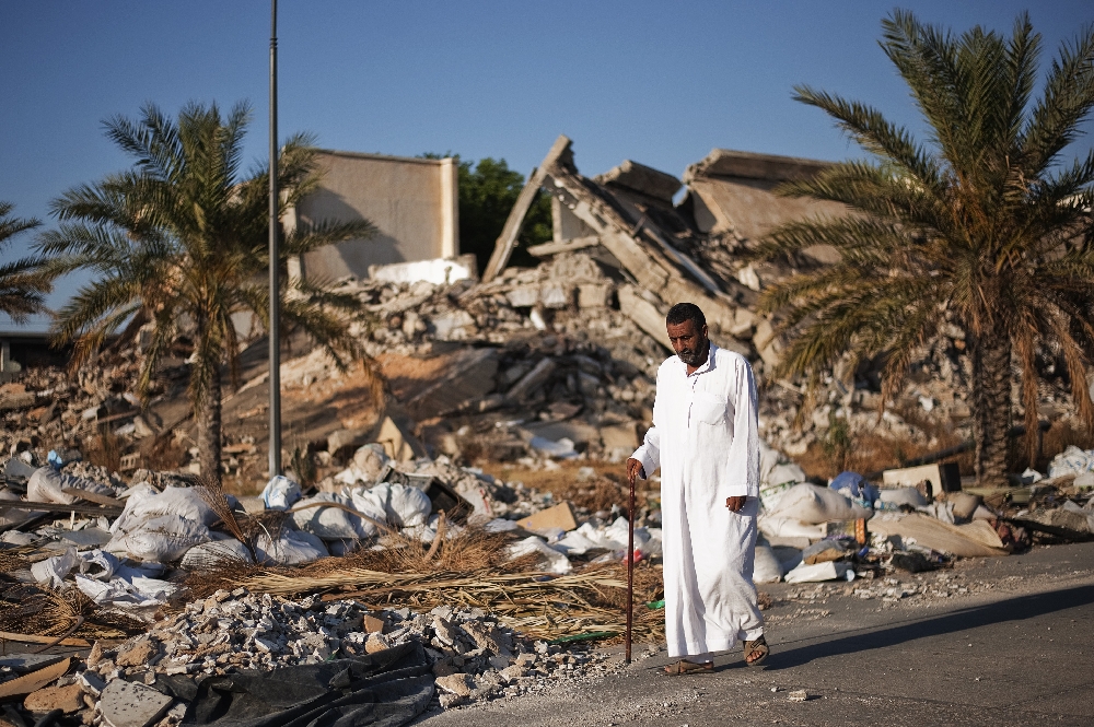 Squatters fill Gaddafi compound as Libya housing crisis bites
