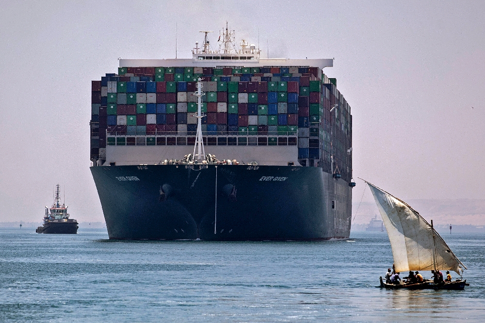 Megaship that blocked Suez heads back to Asia