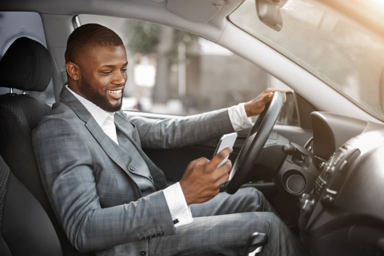 This is How Age Affects Your Car Insurance Premium - Young black man driving his car