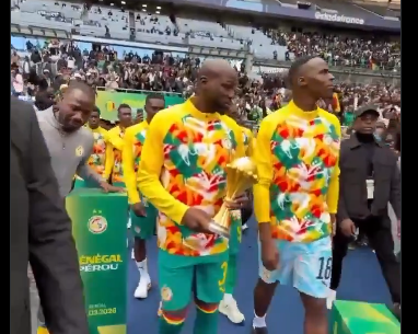 Senegal parade disputed AFCON trophy before beating Peru 2-0 in Paris friendly