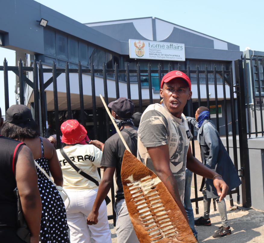 Stick-wielding vigilantes harass asylum seekers
